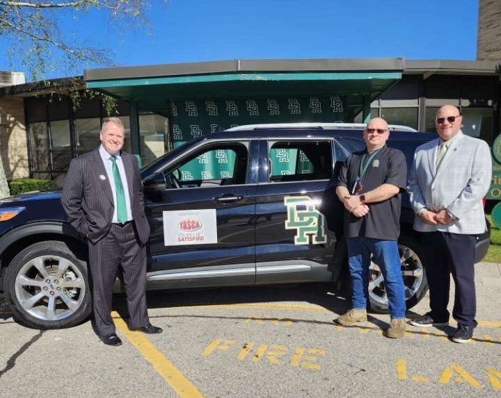 Micheal Strojny, MIcheal Inman, and Bill Runey, showing off the new vehicle.