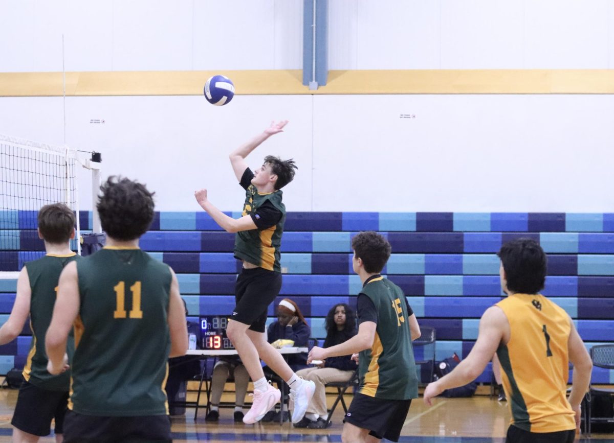 Sophomore setter Aiden Beagan slams down on the competition. 